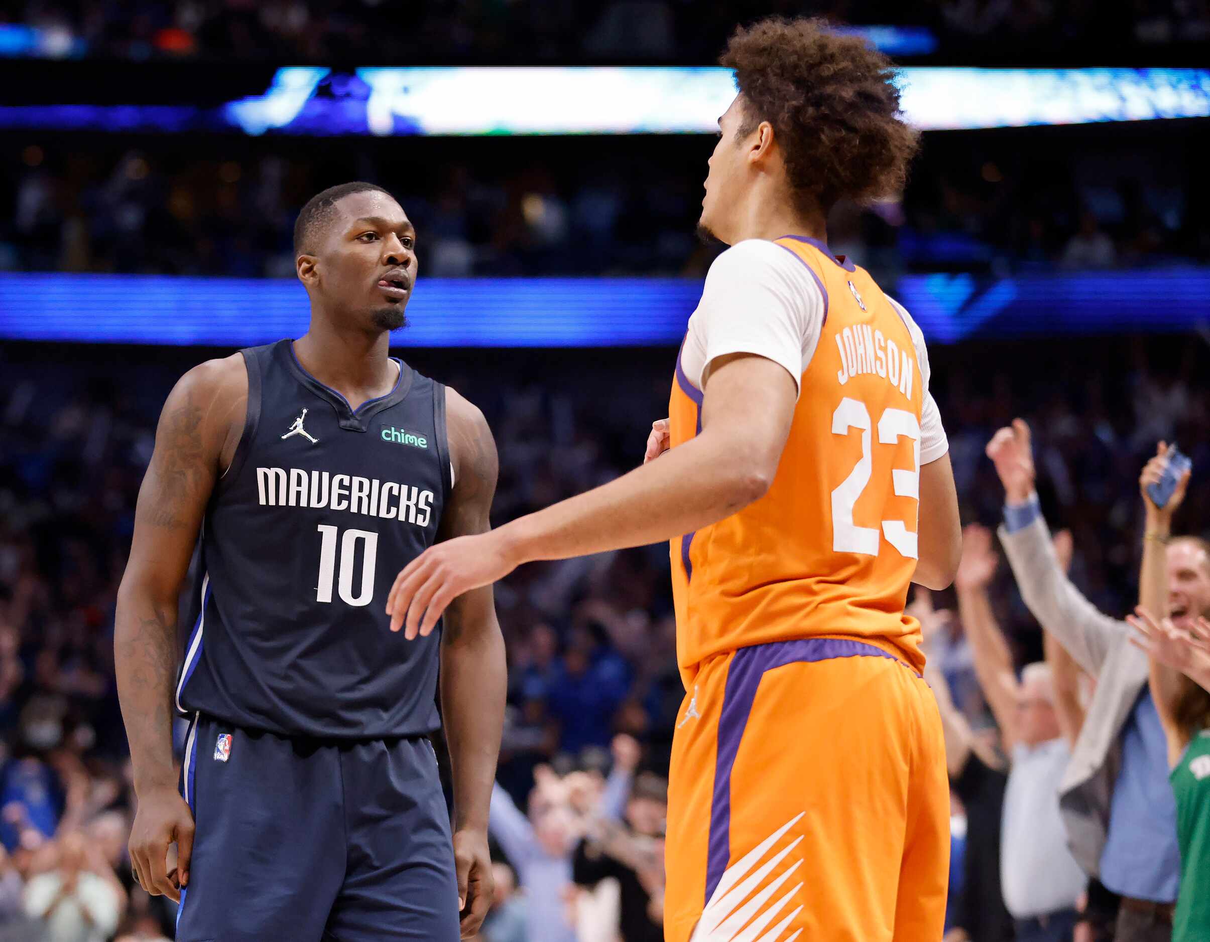 Dallas Mavericks forward Dorian Finney-Smith (10) reacts after nailing a a fourth quarter...