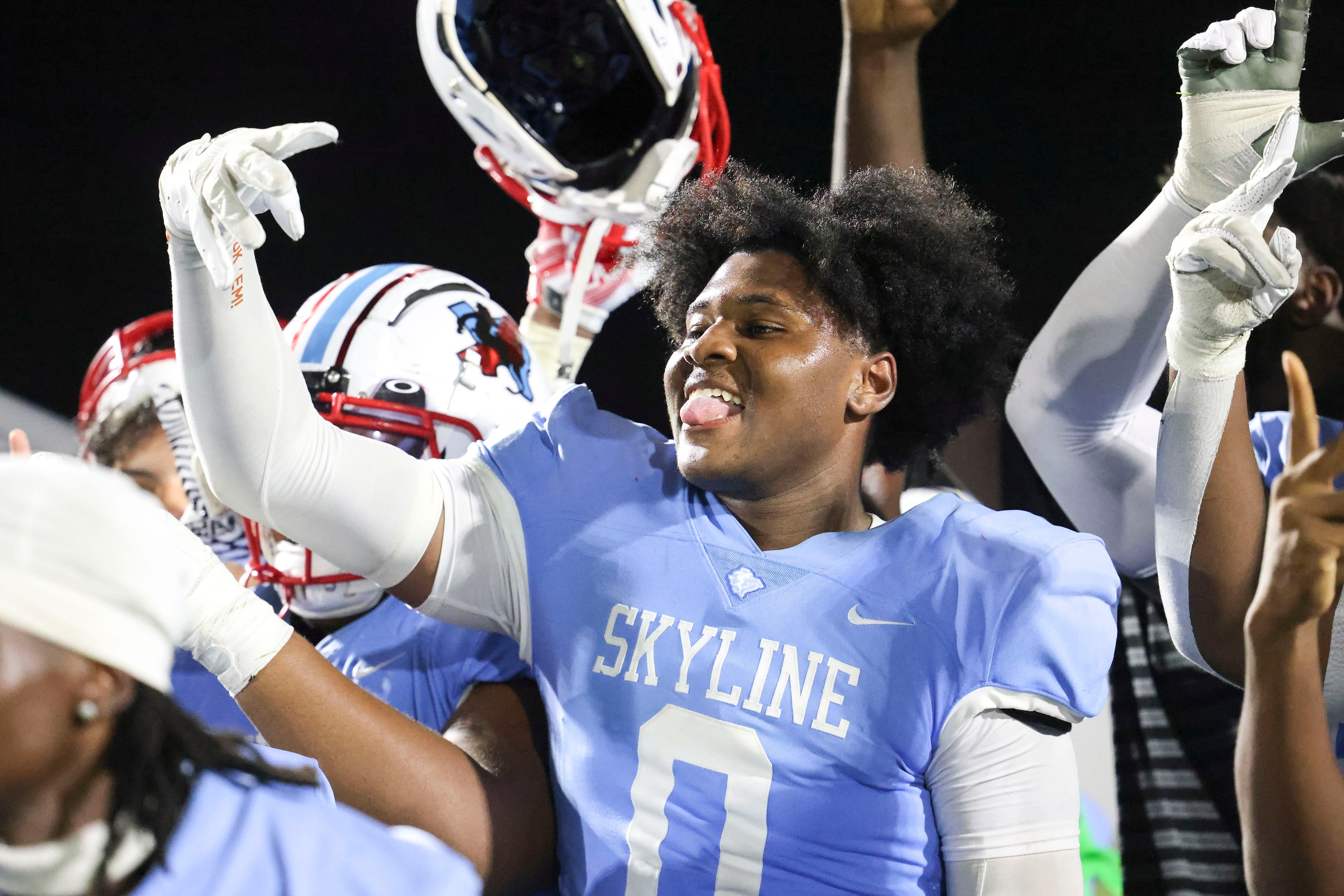 Skyline High’s Elian Barnes (0) celebrates following this team’s win against North Forney...