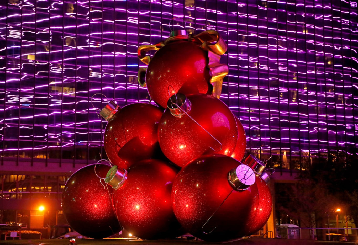 The Omni's big, red ornaments weigh 1,200 apiece. They're set into place with a crane. 