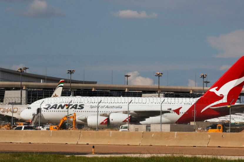 Qantas Airlines airplane parked on the tarmac at DFW International Airport on Wednesday,...