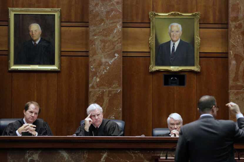 Justice Don Willett (left), shown in a 2015 oral argument at the Texas Supreme Court, would...