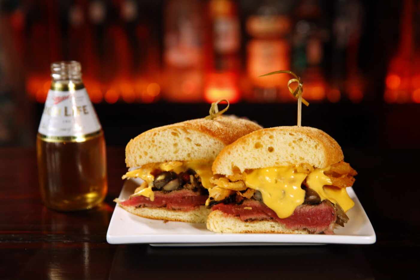The Steak and Cheese sandwich comes with grilled ribeye, mushroom ragout, cheddar foam,...