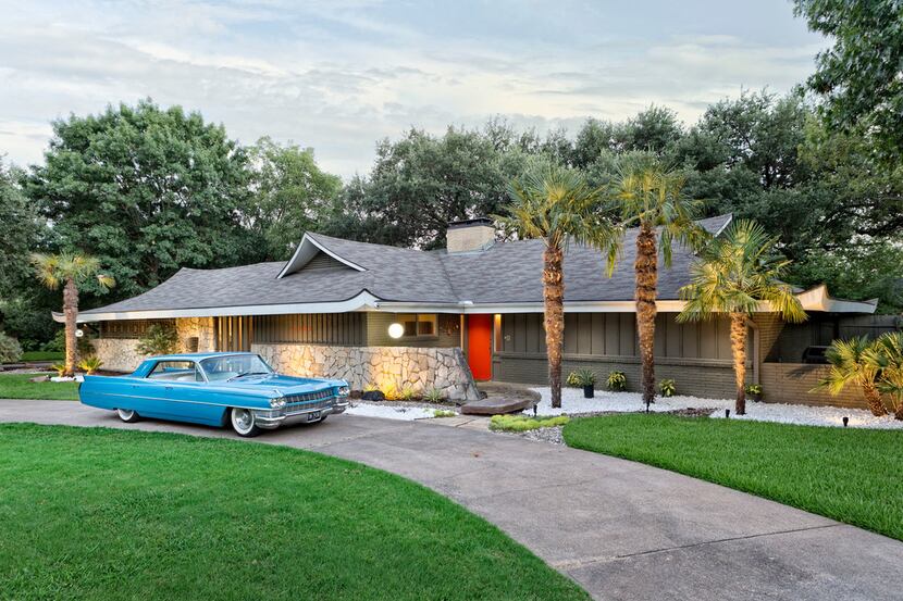 Furnished with authentic, midcentury modern furniture, this Chinese modern home on the...