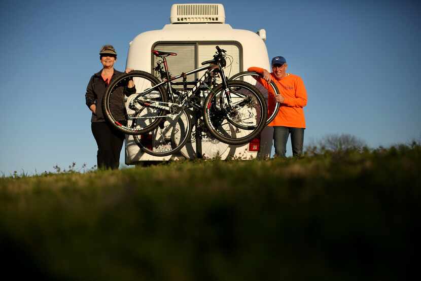 With a bike rack installed on their trailer, Keven Ann Willey and Georges Badoux crossed off...