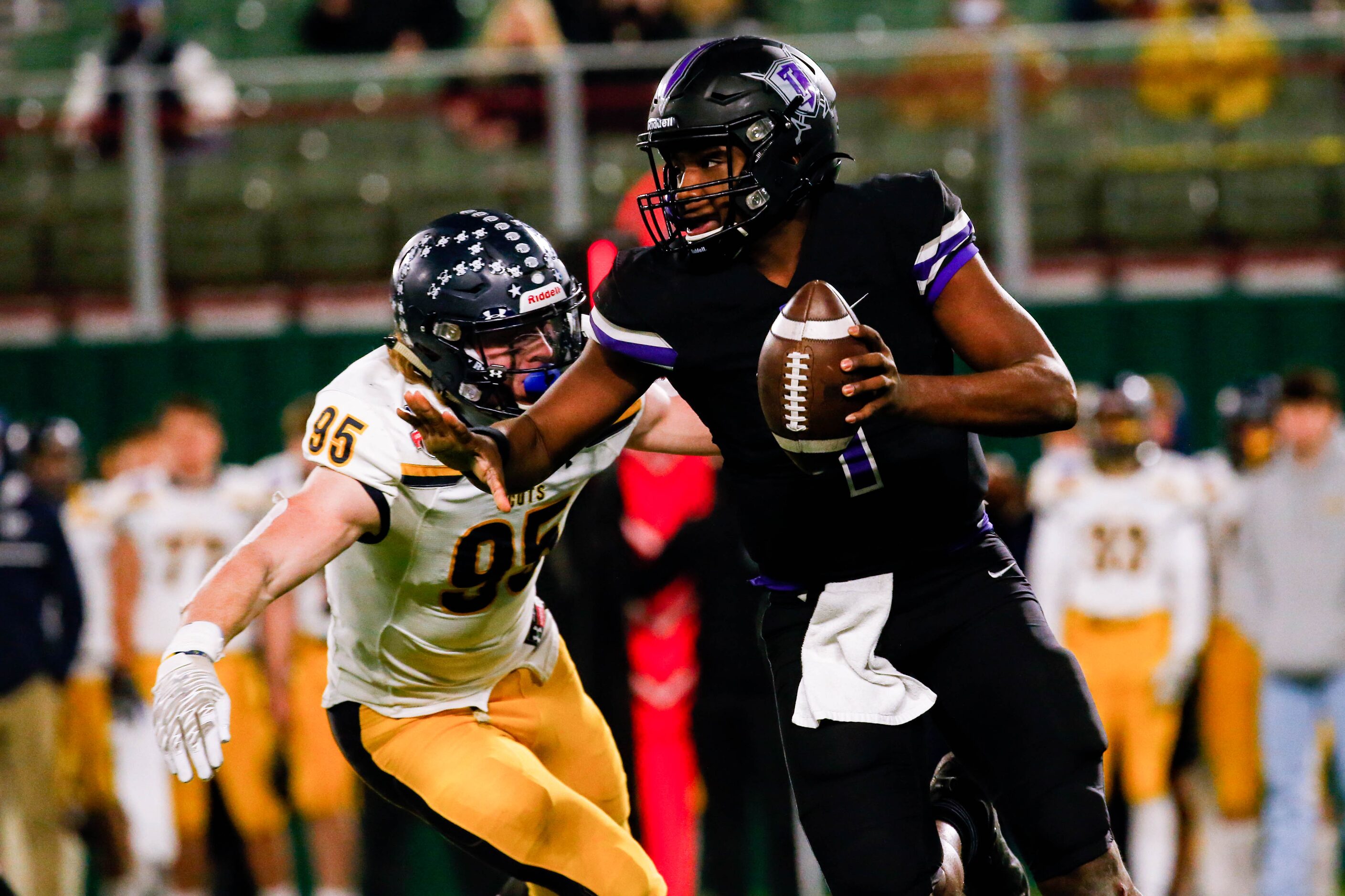 Highland Park's Jack Curtis (95) sacks Frisco Independence's Braylon Braxton (1) during the...