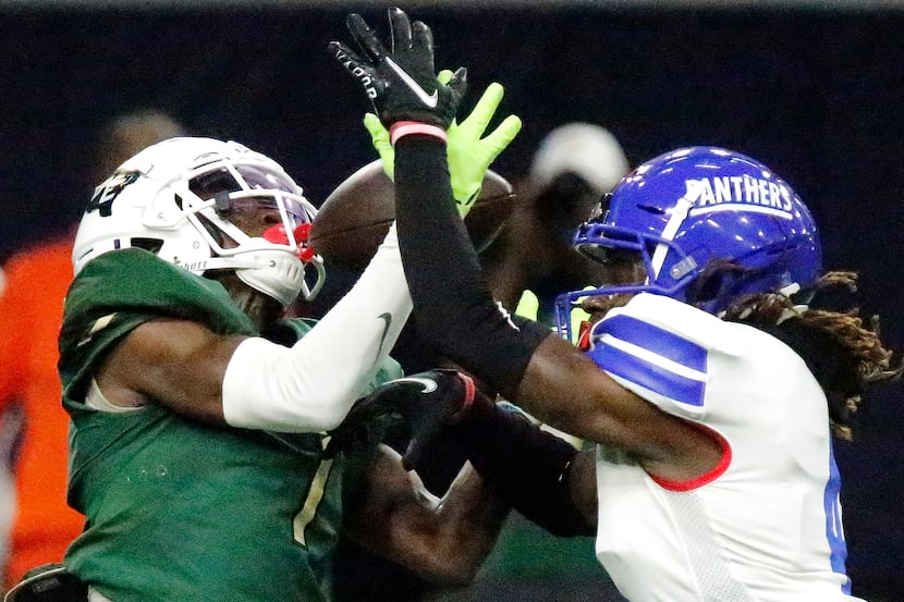 DeSoto High School wide receiver Johntay Cook ii (1) makes this catch and goes on to score a...