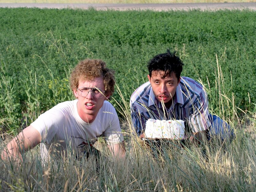 Jon Heder (as Napoleon Dynamite) and Efren Ramirez (Pedro) plot their delivery of a cake in...