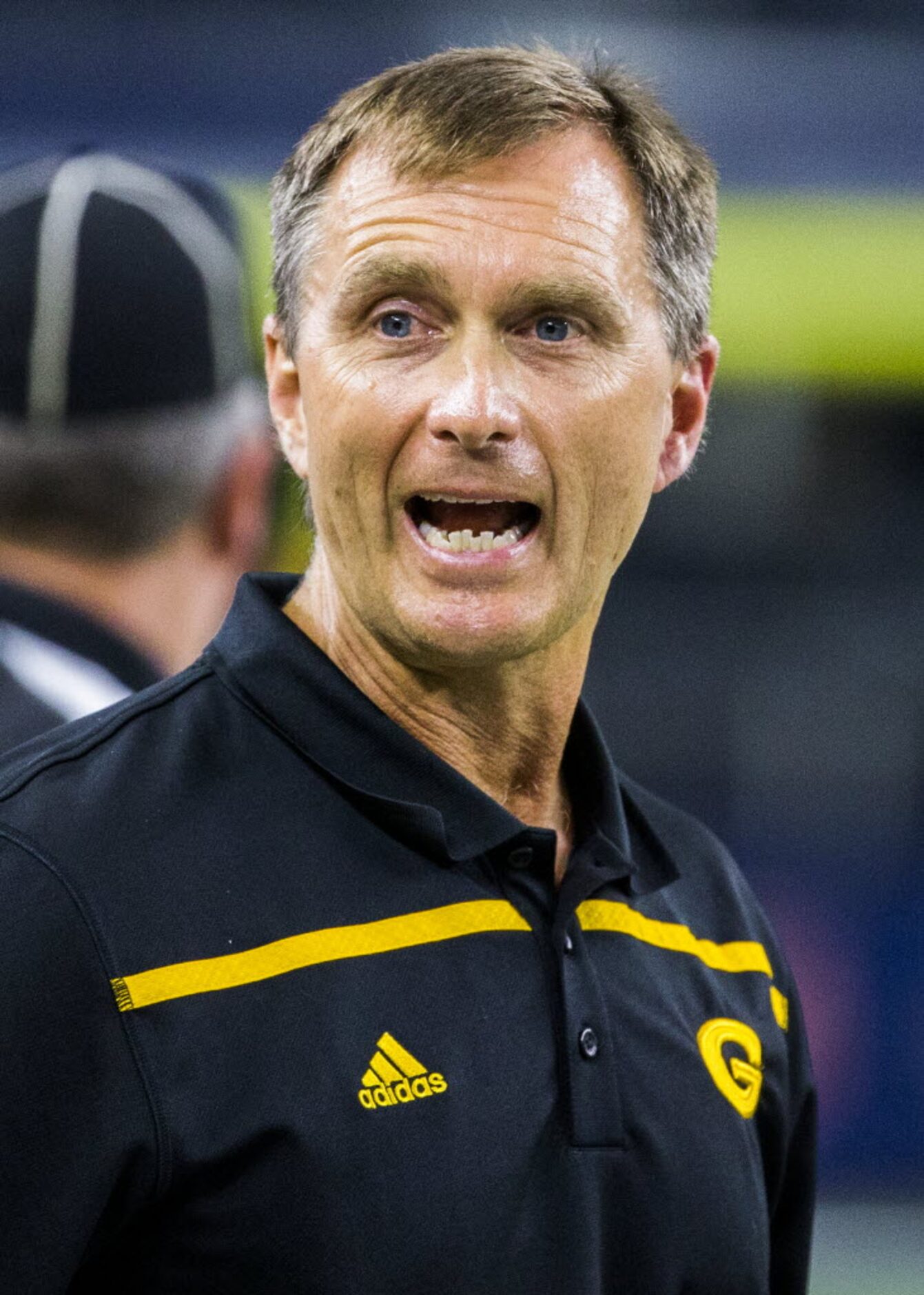 Garland head coach Jeff Jordan talks to players on the sideline during the fourth quarter of...