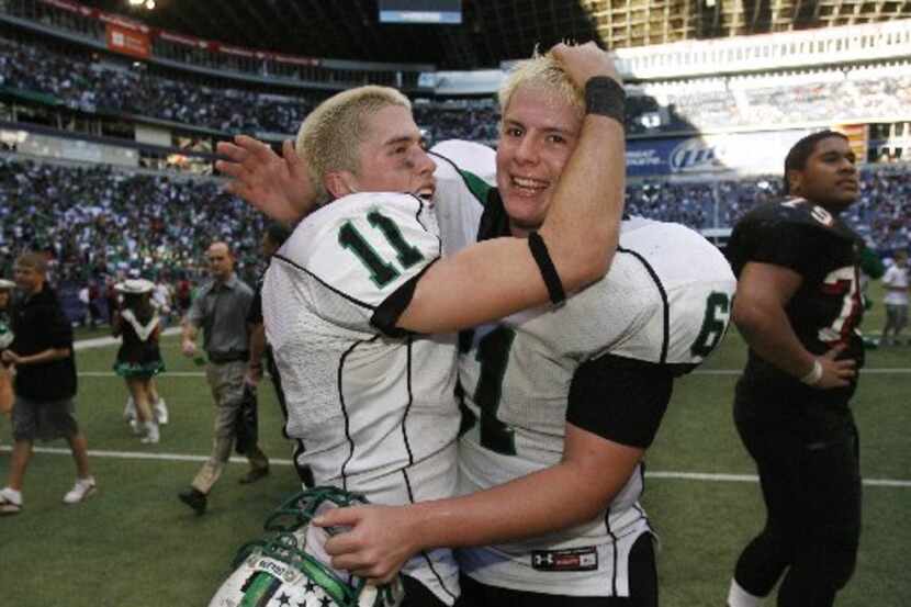 ORG XMIT: *S18F24B1A* Southlake QB Riley Dodge (11 - left) and Nick Leppo (61) celebrate...