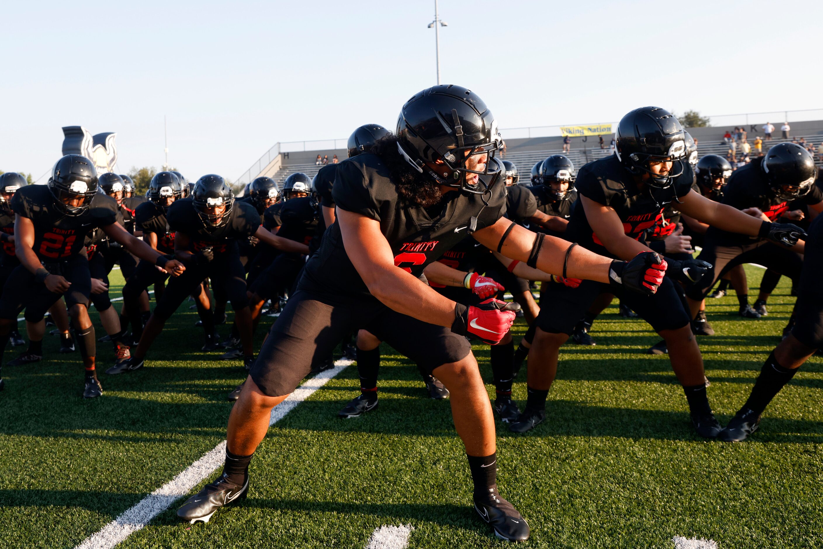 Euless Trinity defender Nai Mose leads the team in the haka dance prior to playing Arlington...