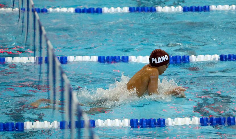 Plano's Darin Suwannakinthorn comes up for air enroute to his first place finish in the Boys...