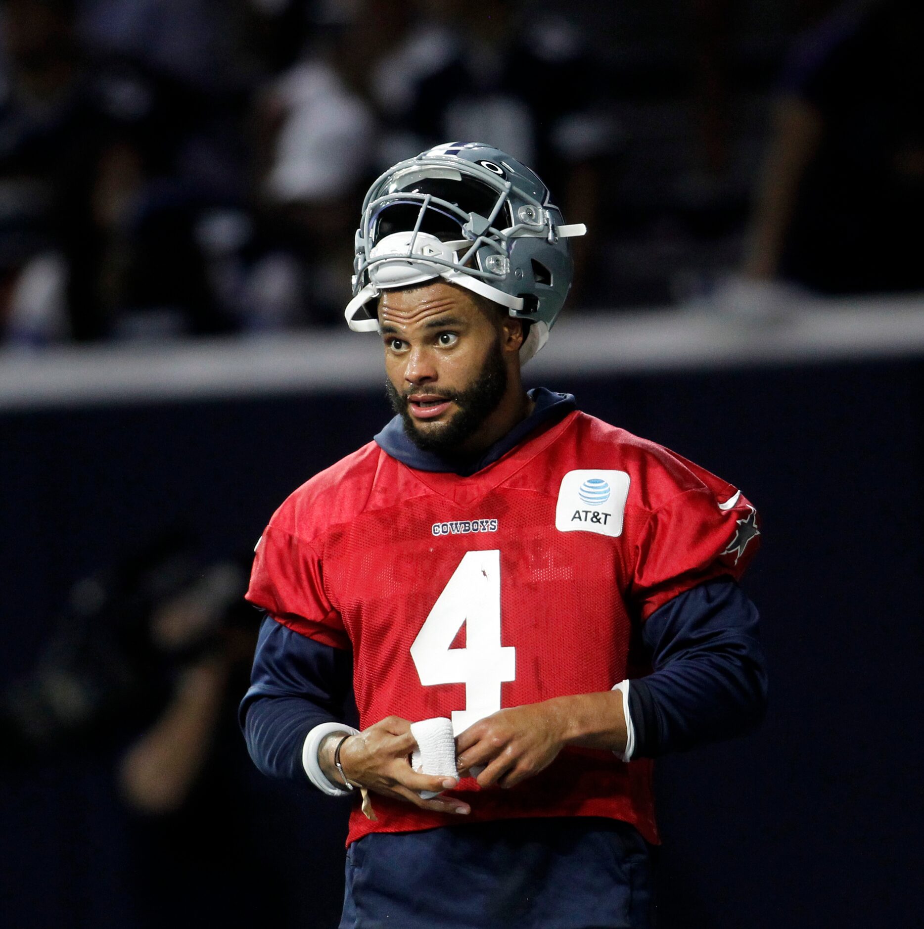 Dallas Cowboys quarterback Dak Prescott (4) prepares to take first reps during a team...