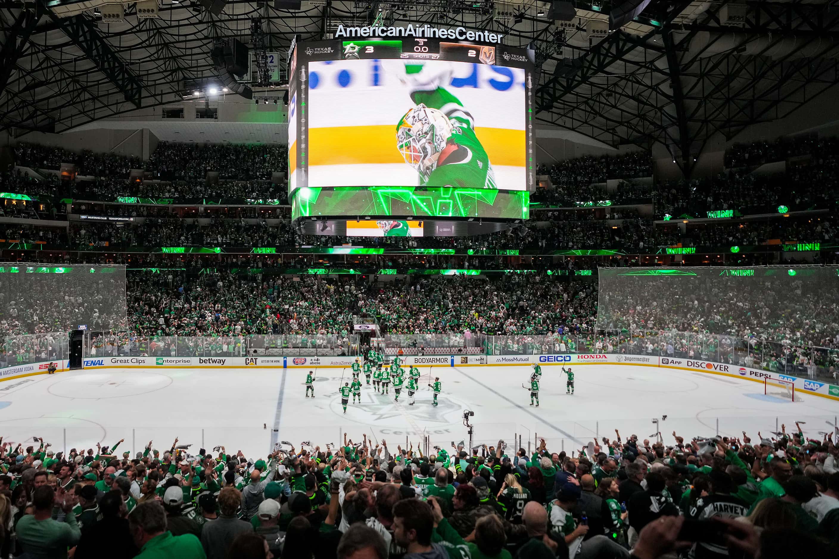 Dallas Stars players and fans celebrate after a 3-2 victory over the Vegas Golden Knights in...