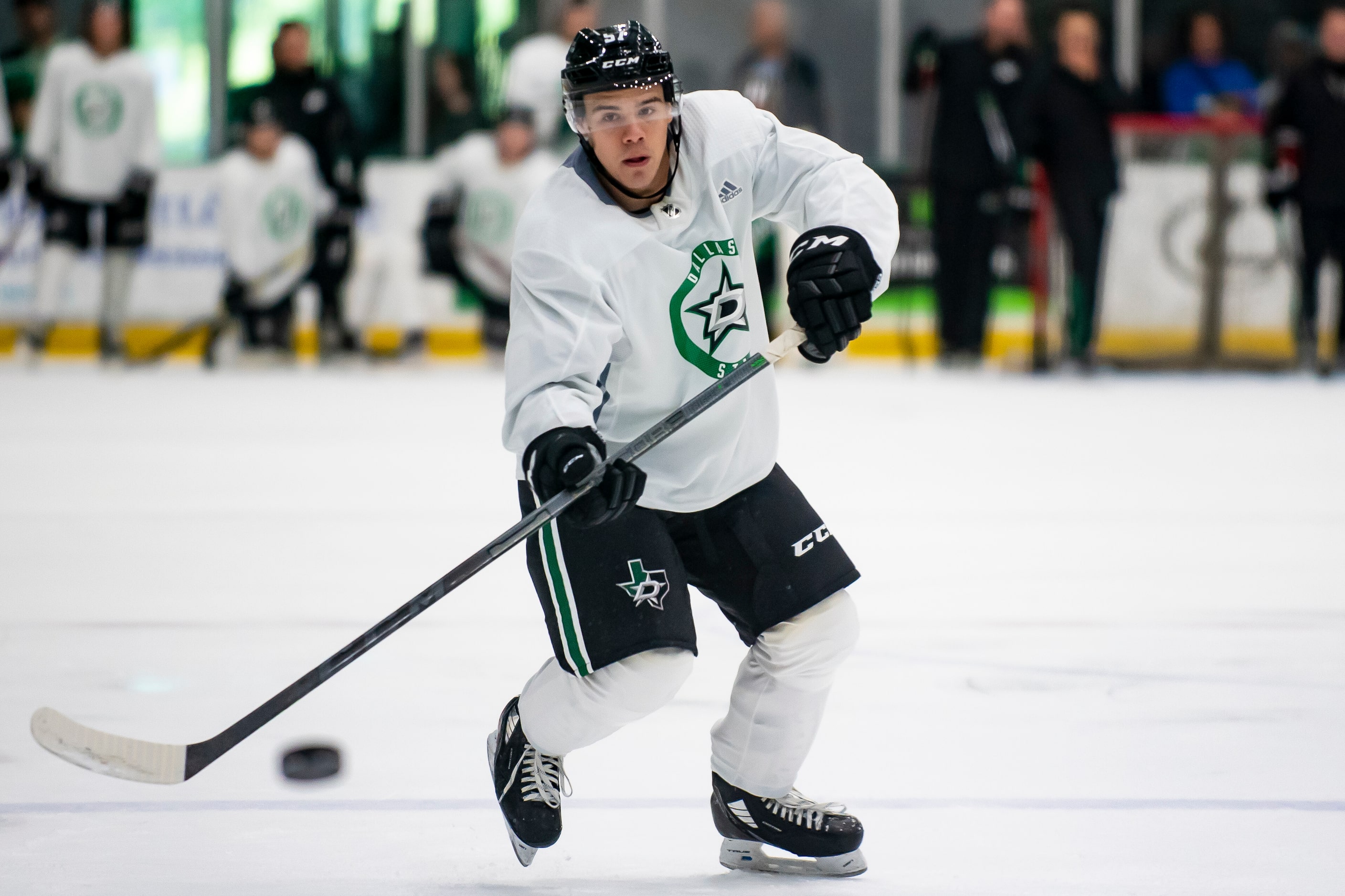 Forward Logan Stankoven (57) fires a shot at the goal while going through a drill during the...