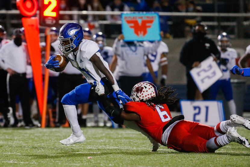 Fort Worth Nolan's Irene Ngabonziza (7) is grabbed by Parish Episcopal's Kenneth Borders (6)...