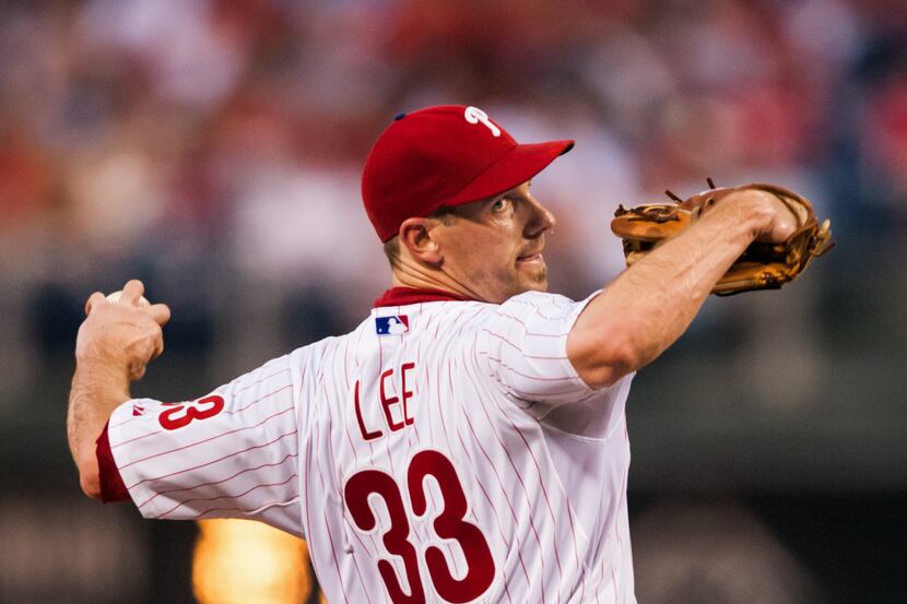 Jul 10, 2013; Philadelphia, PA, USA; Philadelphia Phillies pitcher Cliff Lee (33) delivers...