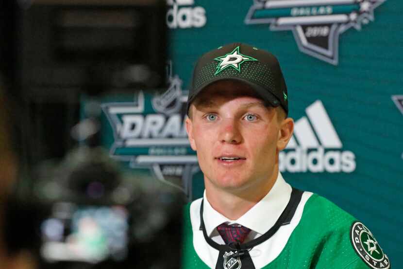 Dallas Stars first round draft pick Ty Dellandrea talks with the media after being selected...