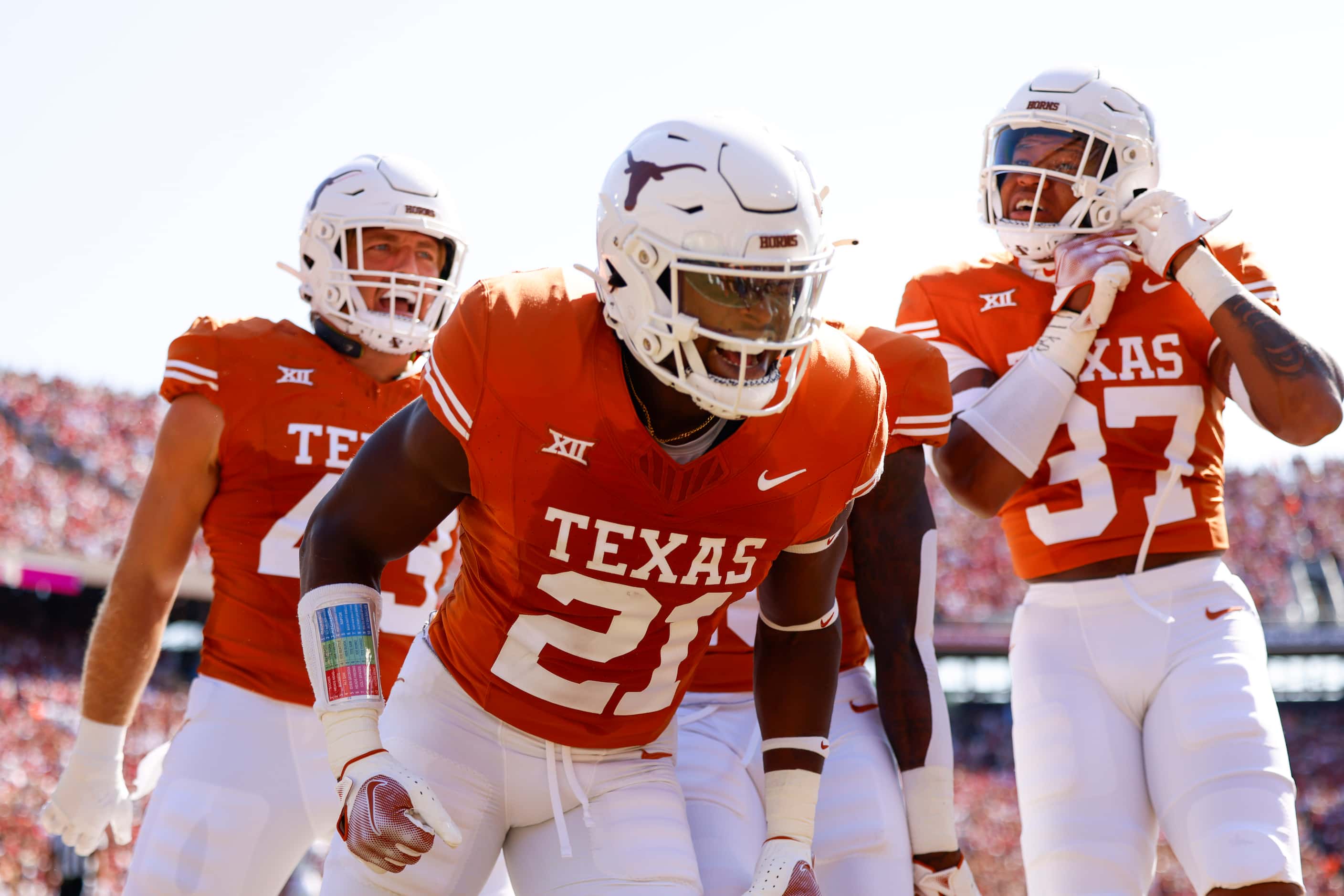 Texas defensive back Kitan Crawford (21) celebrates a touchdown against Oklahoma during the...