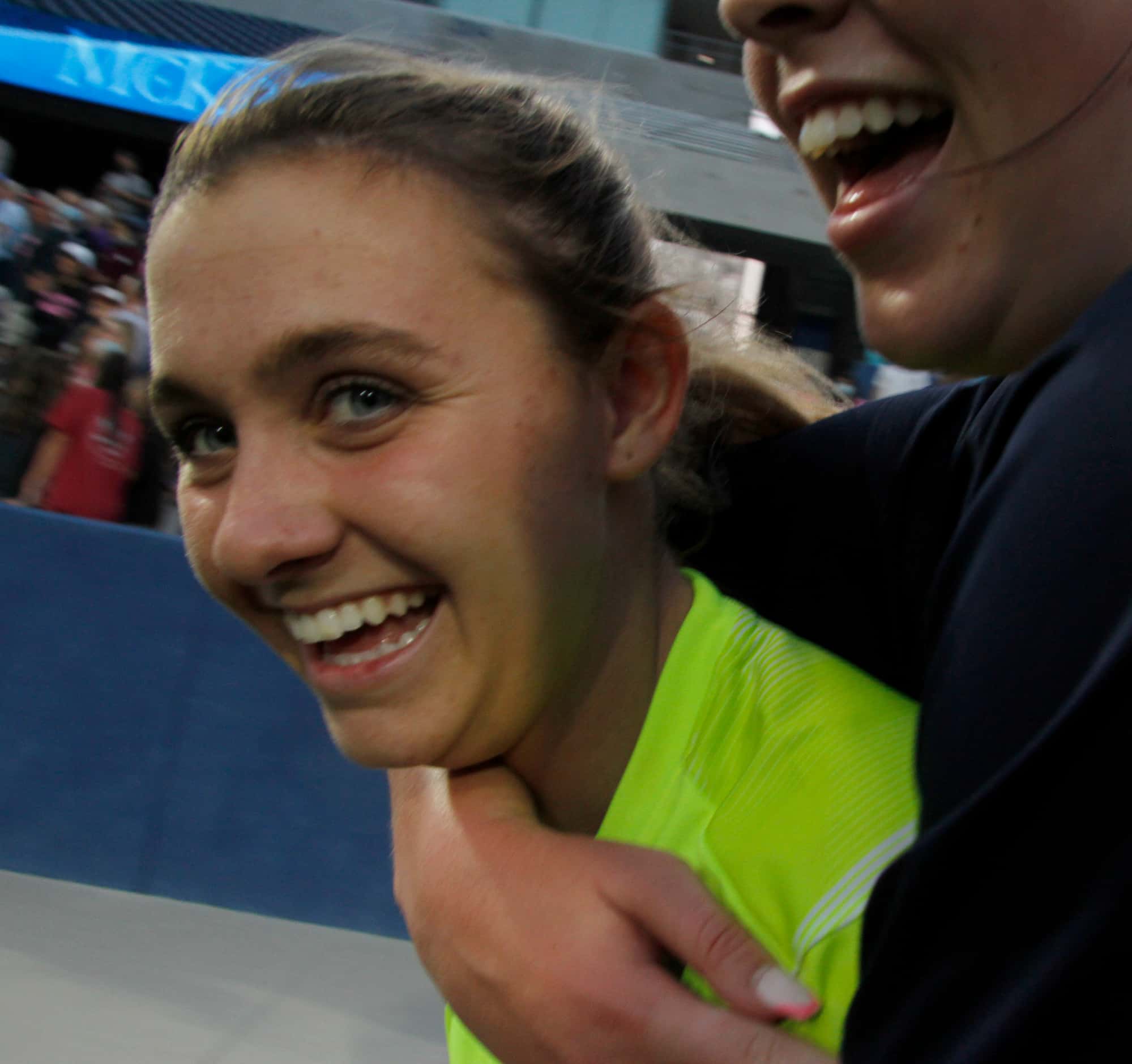 Flower Mound goal keeper Peyton Whipple (1) was all smiles as she was congratulated by...