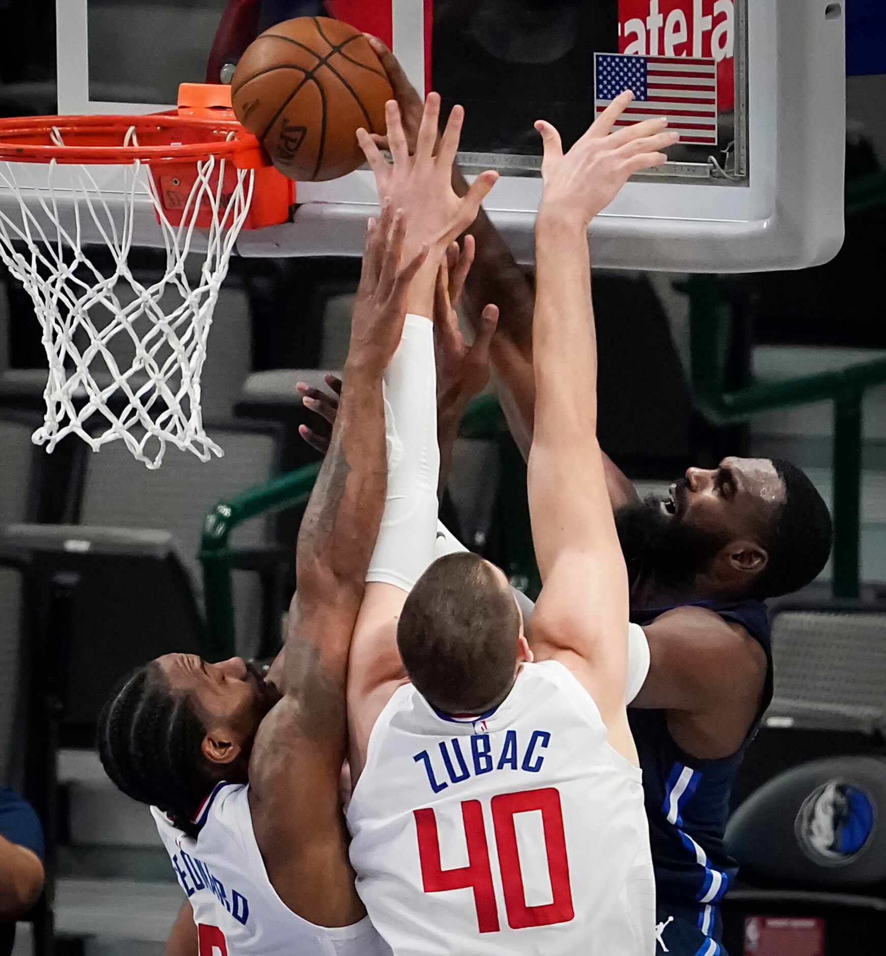 Dallas Mavericks forward Tim Hardaway Jr. (11) misses a dunk as LA Clippers forward Kawhi...