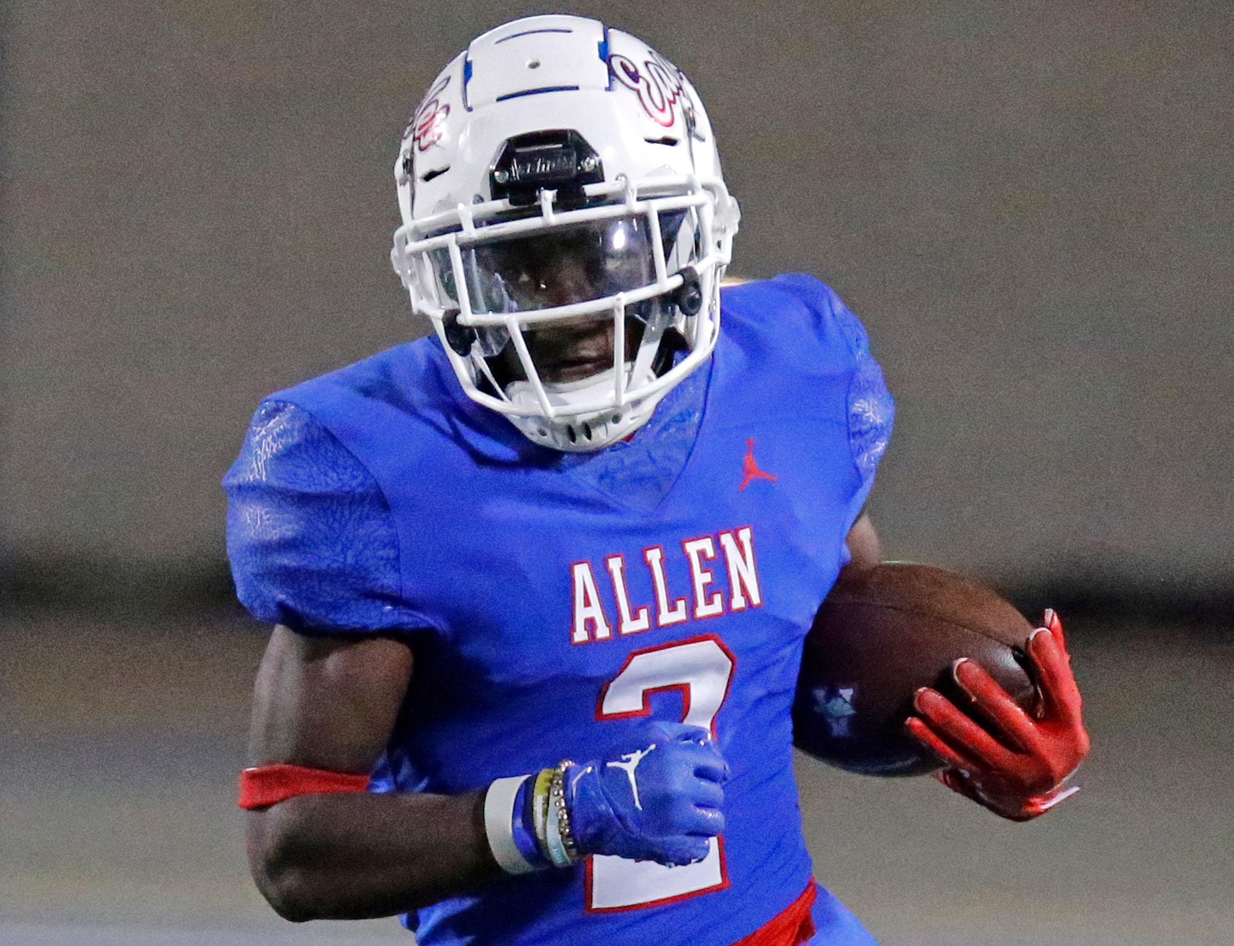 Allen High School running back Kayvion Sibley (2) carris the football for a 23 yard gain...