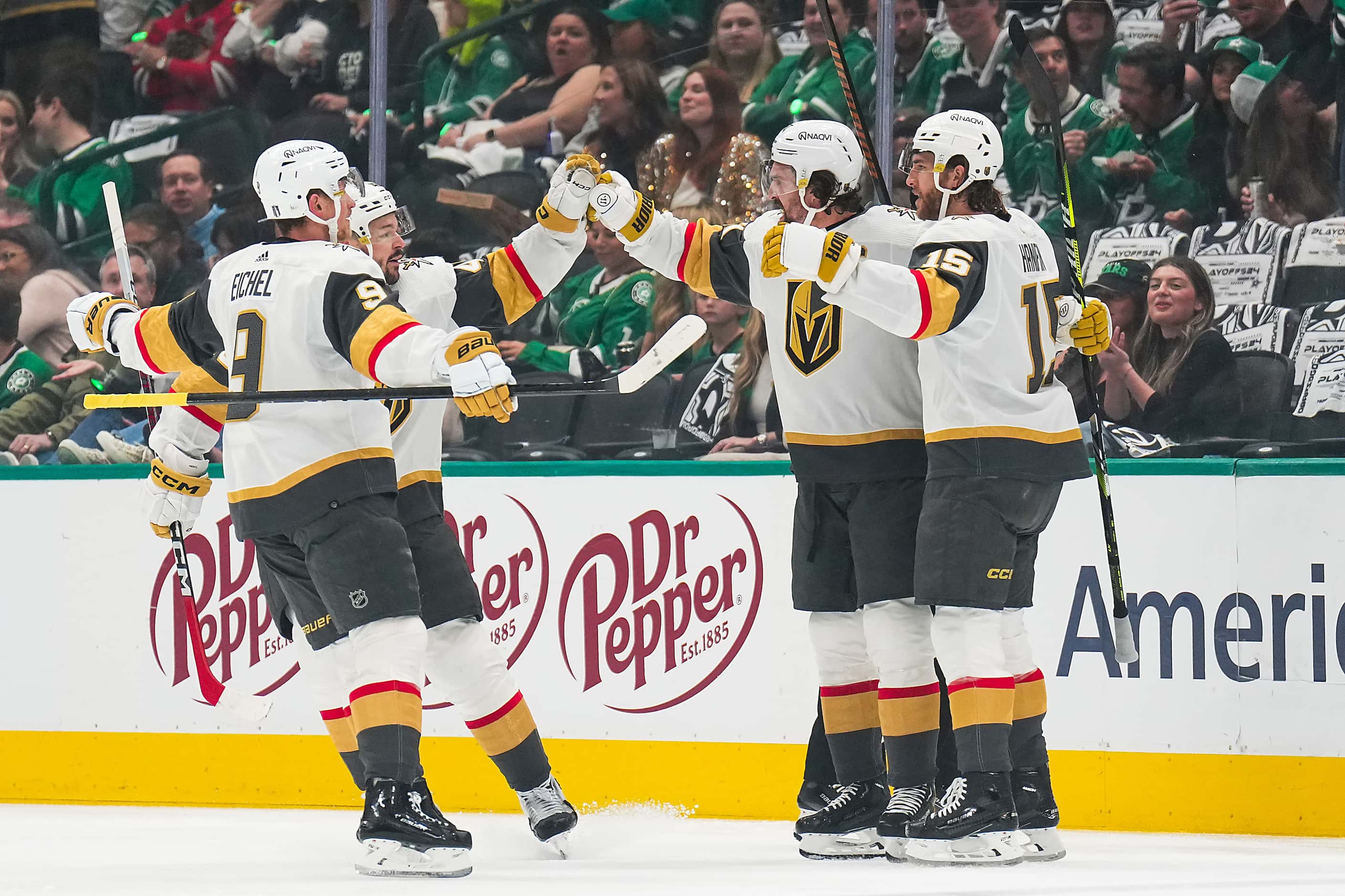 Vegas Golden Knights right wing Mark Stone (61) celebrates with teammates after scoring a...