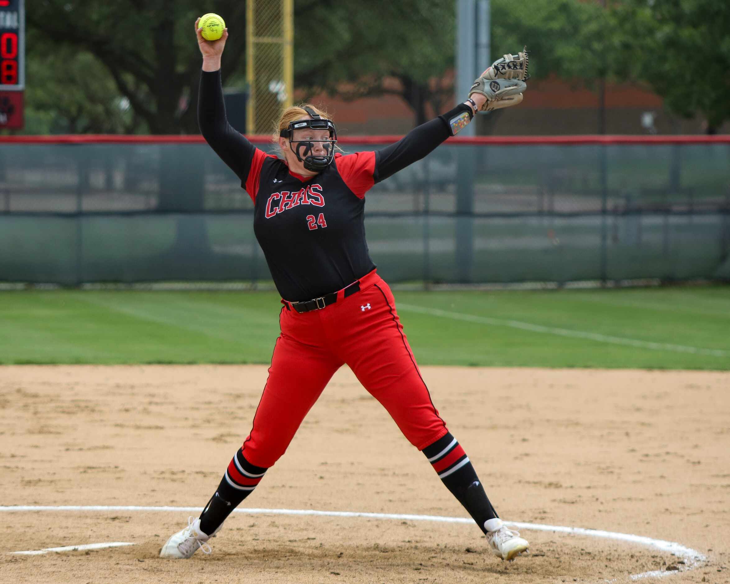 Colleyville Heritage pitcher Presleigh Payne (24) throws the ball during a softball Class 5A...