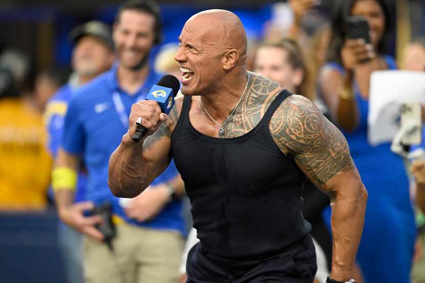 Dwayne Johnson makes an announcement before the Los Angeles Rams play the Buffalo Bills...
