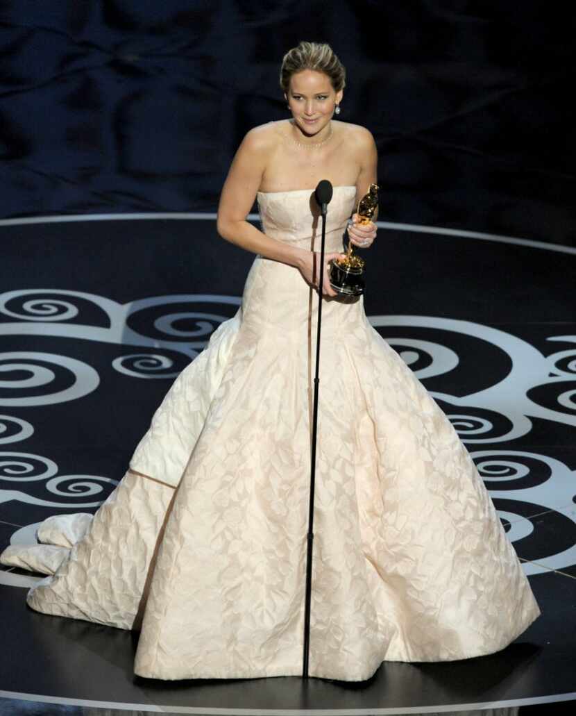 Jennifer Lawrence accepts the Oscar for best actress in a leading role for "Silver Linings...