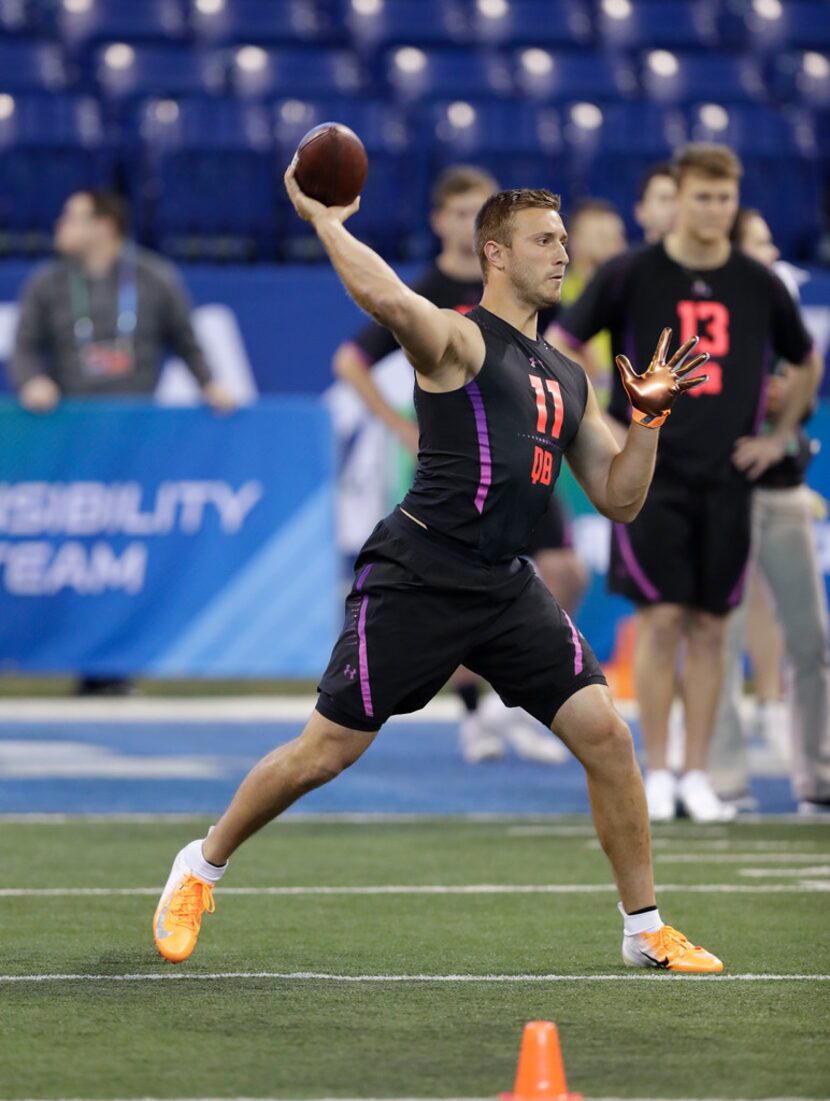 Richmond quarterback Kyle Lauletta throws during a drill at the NFL football scouting...