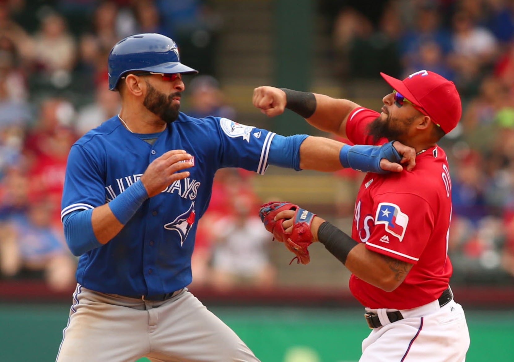 Rangers 2B Rougned Odor Punches Jose Bautista During Brawl  On this date  in 2016, Rougned Odor and the Texas Rangers remembered José Bautista's bat  flip, as Odor landed a punch on