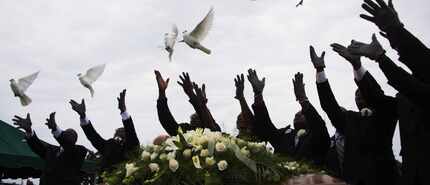  Pallbearers released doves over the casket holding Emanuel AME Church shooting victim Ethel...
