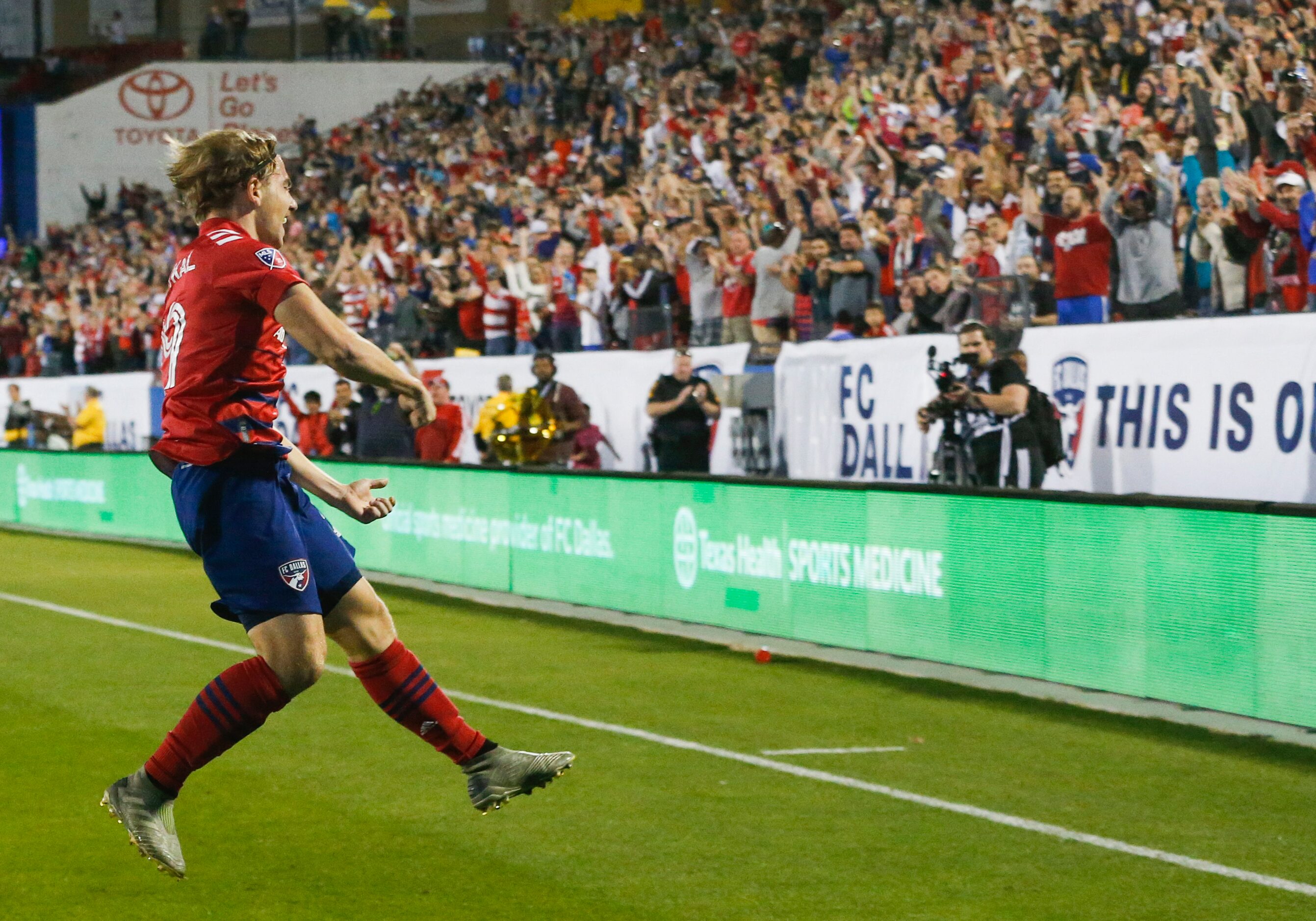 FC Dallas midfielder Paxton Pomykal (19) celebrates a goal during the second half of an MLS...