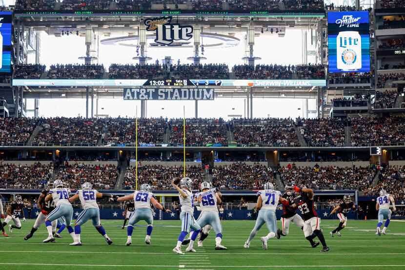 Dallas Cowboys quarterback Cooper Rush (10) throws a pass during the second half of an NFL...