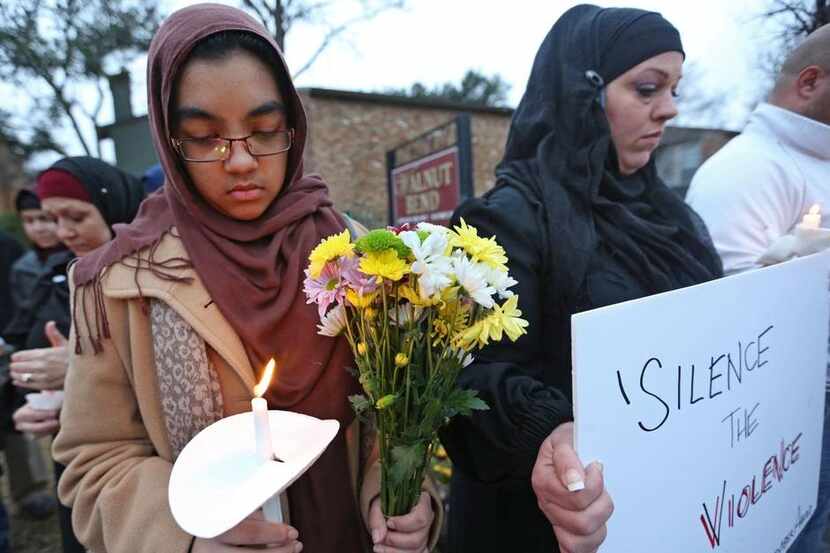  Wafia Gazi (left) and others took part in a vigil for Ahmed al-Jumaili outside his...
