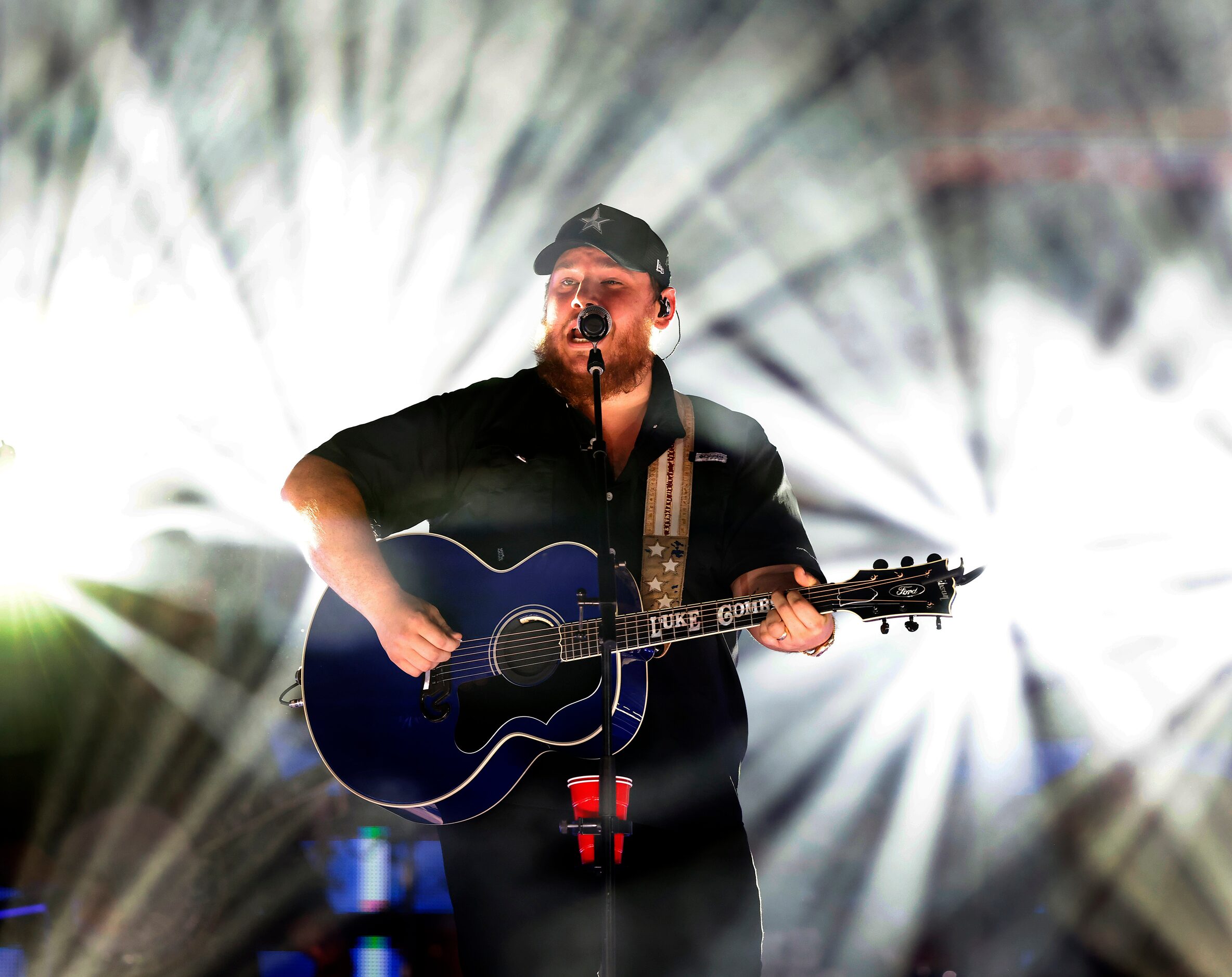 Country artist Luke Combs performs during the halftime show at AT&T Stadium in Arlington,...