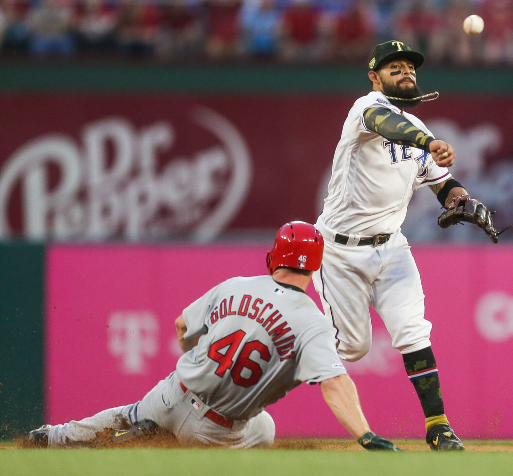 Texas Rangers second baseman Rougned Odor (12) throws to first after tagging out St. Louis...