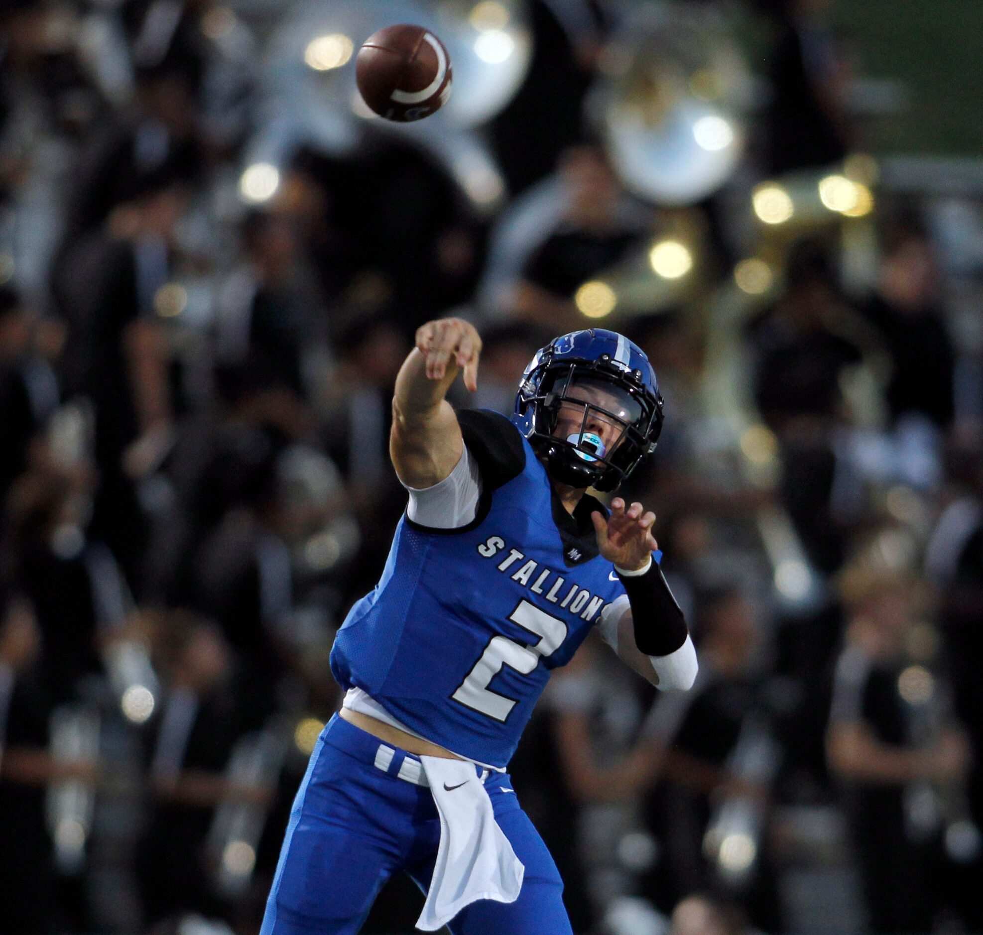 North Mesquite quarterback Luke Seder (2) launches a long pass during first half action...