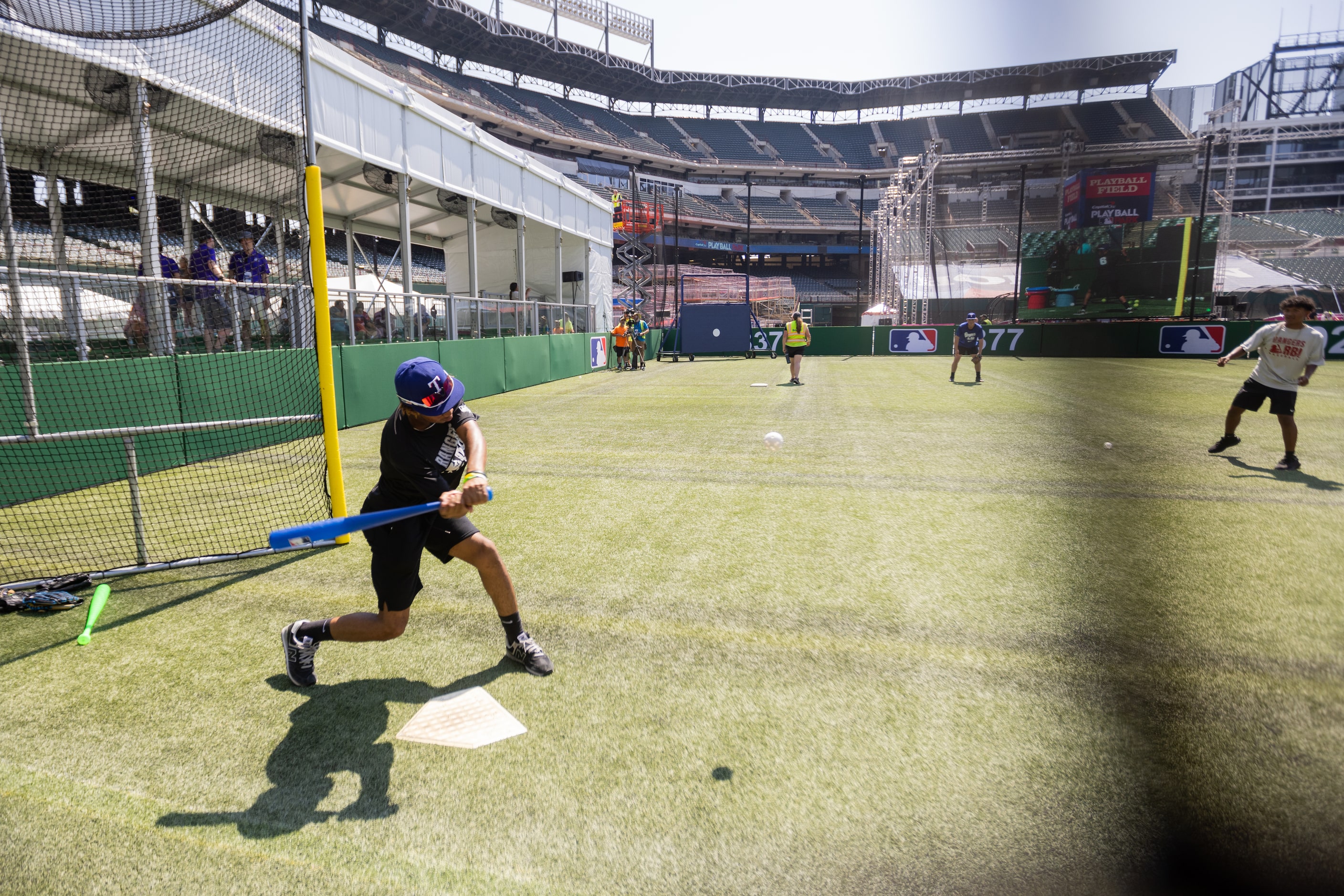 Texas Rangers Academy’s Vincent Hood, 15, of Mansfield hits the Wiffle ball at MLB's...