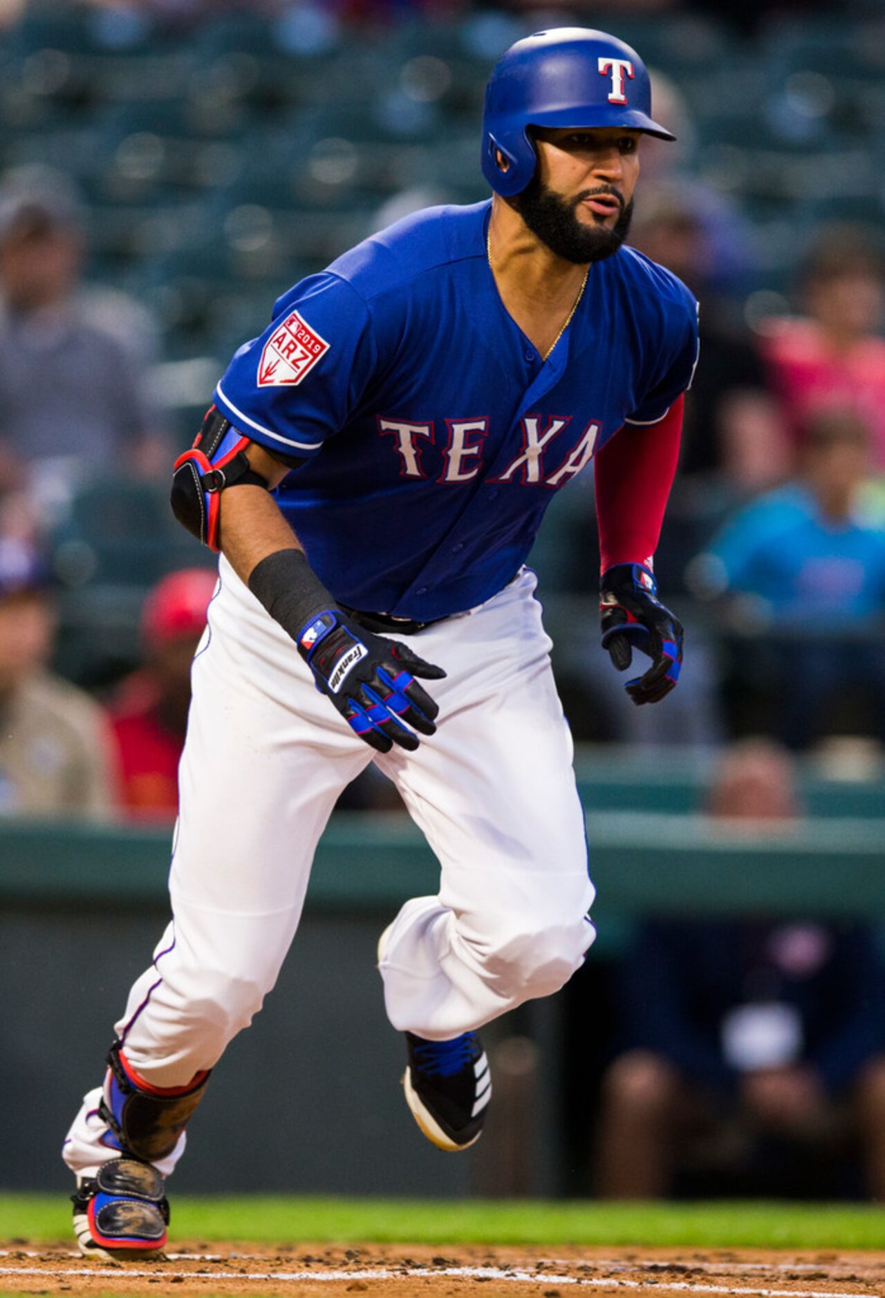 Texas Rangers right fielder Nomar Mazara (30) runs to first after a hit during the second...