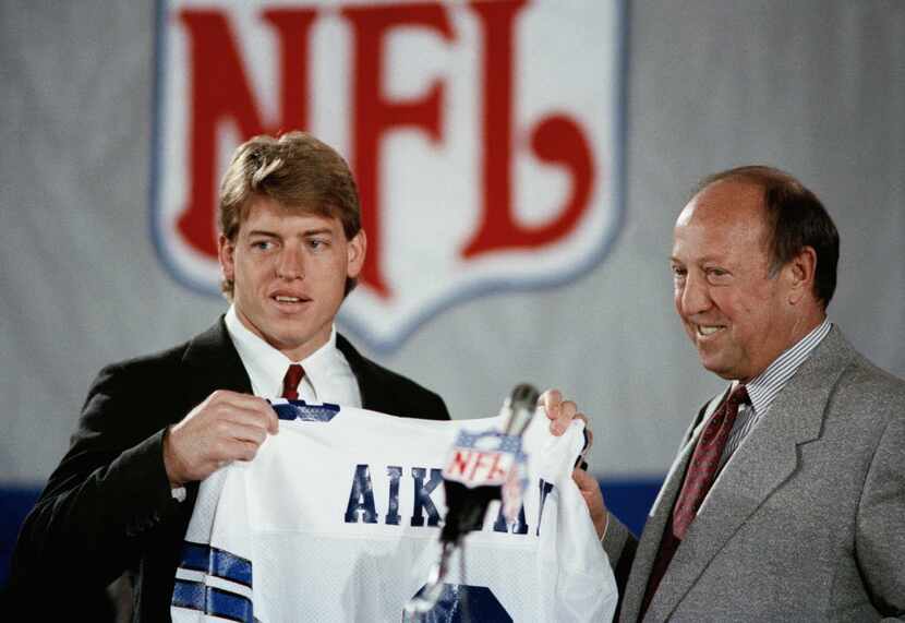 Pete Rozelle, NFL commissioner, right, began the 54th annual draft of collegiate talent. His...