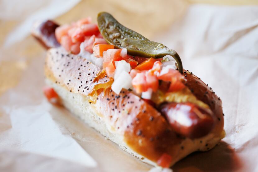Chef Brian Luscher does his own spin on a Chicago dog at Luscher's Red Hots.