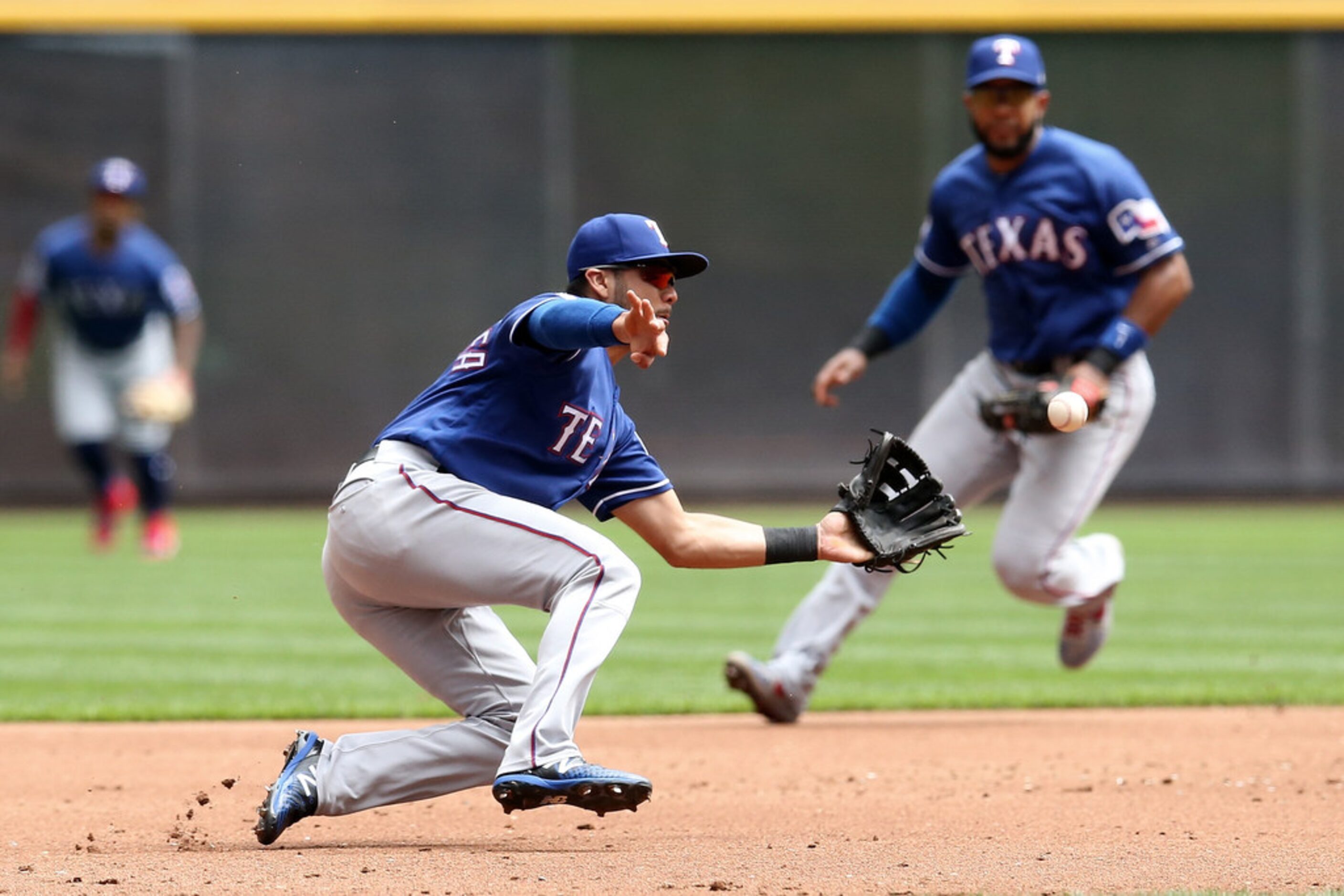 MILWAUKEE, WISCONSIN - AUGUST 11:  Isiah Kiner-Falefa #9 of the Texas Rangers fields a...