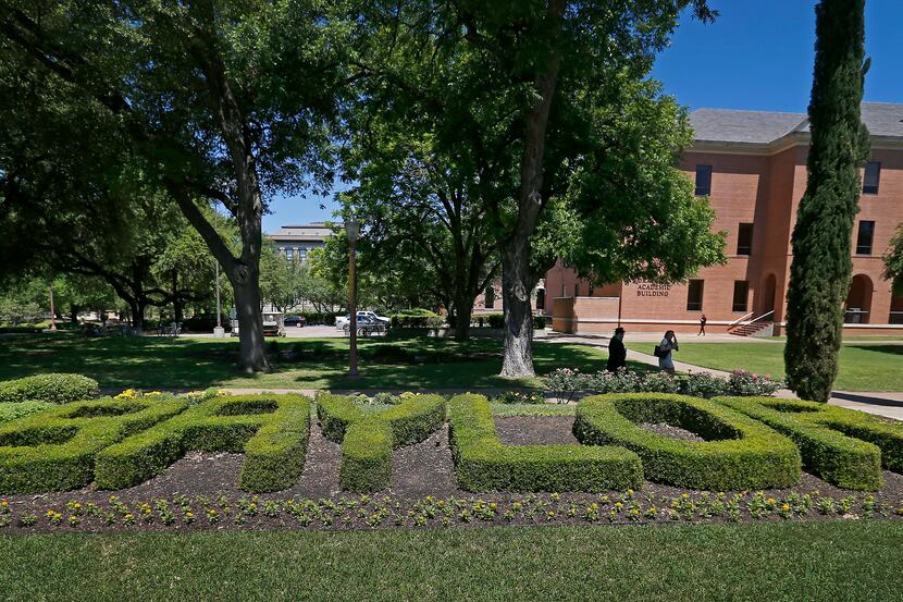 People walk near Pat Neff Hall on the Baylor University campus in Waco, Texas, Tuesday, May...