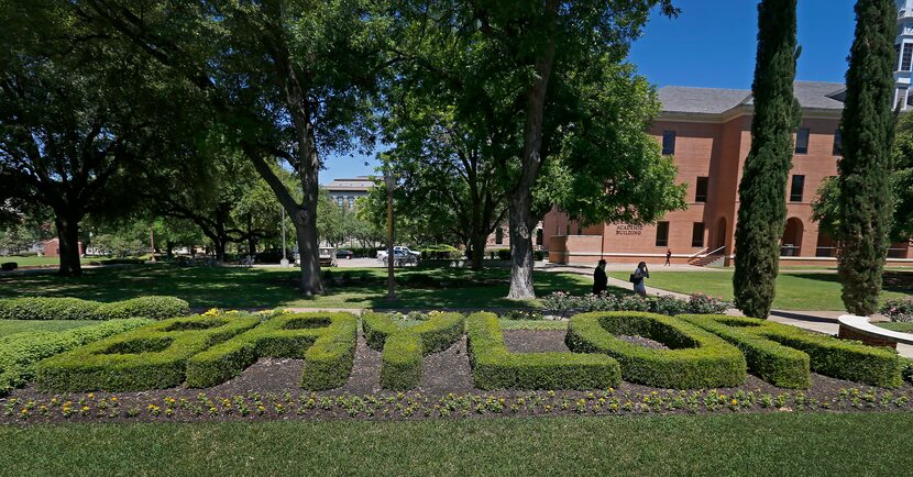 People walk near Pat Neff Hall on the Baylor University campus in Waco, Texas, Tuesday, May...