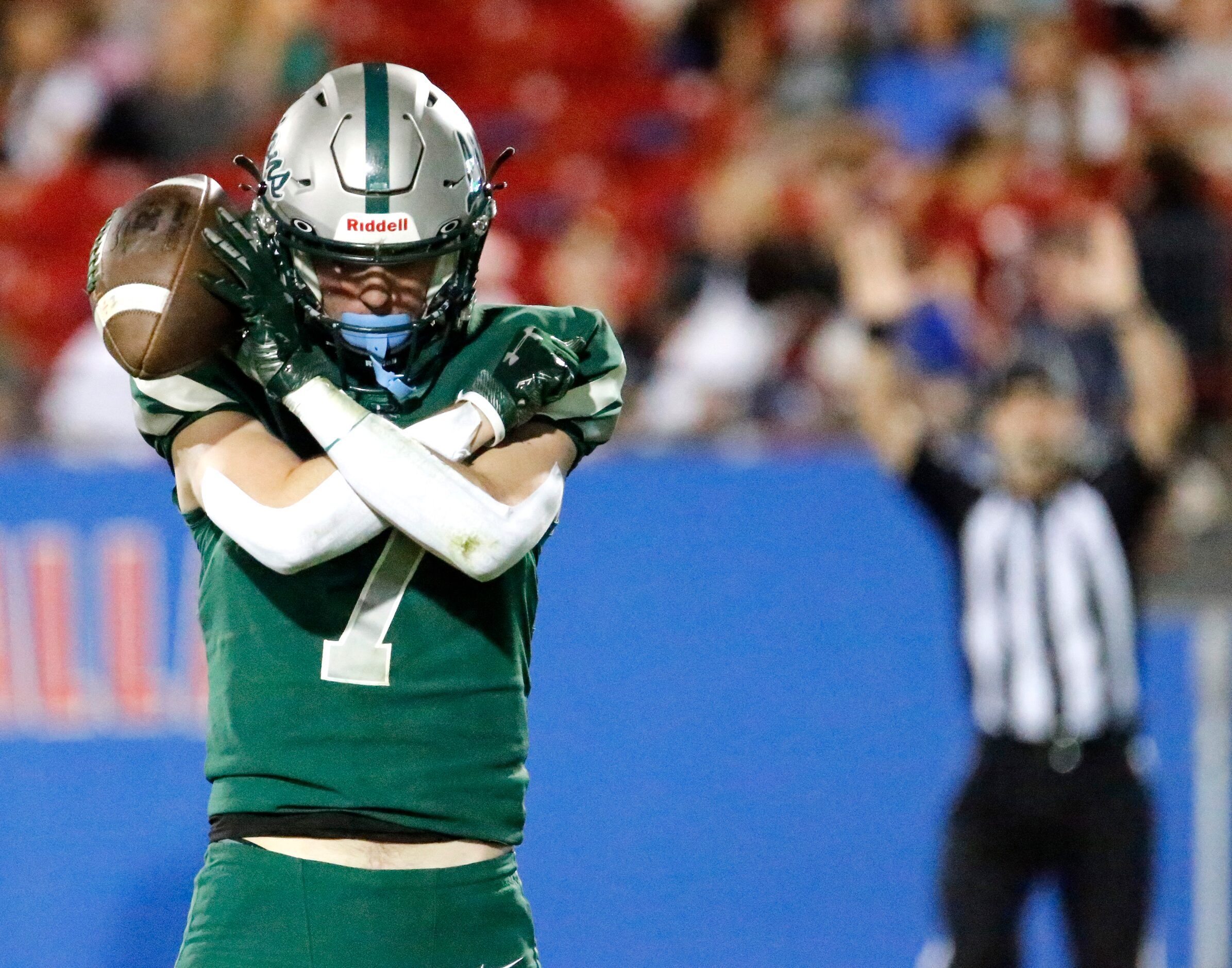 Reedy High School wide receiver AJ Jayroe (7) celebrates a touchdown during the first half...