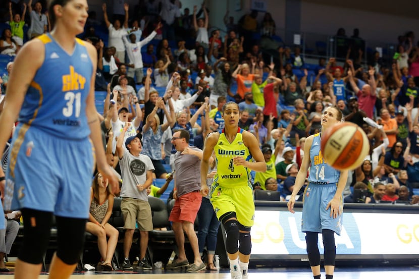 The crowd reacts to a made three pointer by Dallas Wings guard Skylar Diggins-Smith (4) as...