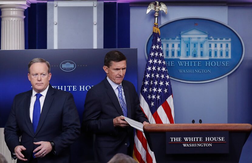 Michael Flynn (right) with White House press secretary Sean Spicer (AP Photo/Carolyn Kaster,...