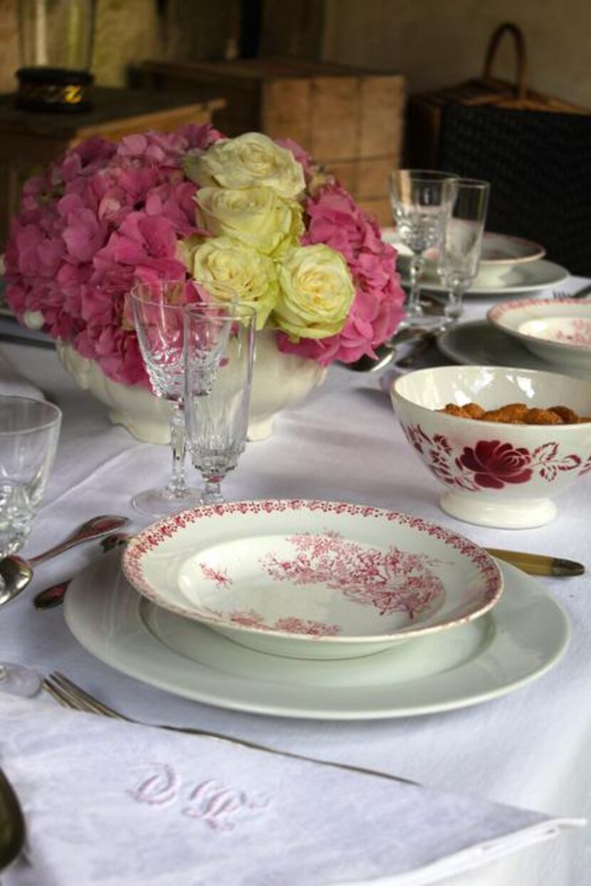 
Table set for alfresco luncheon at Friedman's French home
