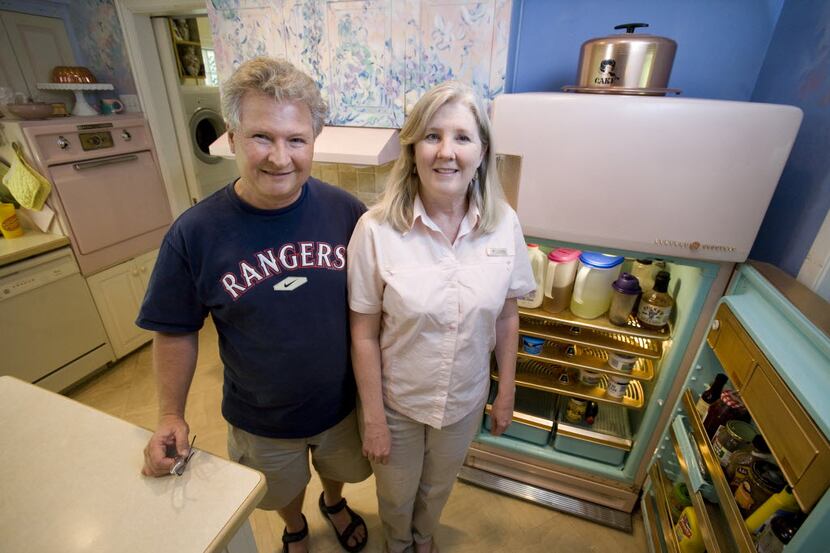 Lee and Melissa Higginbotham own a working vintage 1956-57 GE fridge and a GE stove and oven...